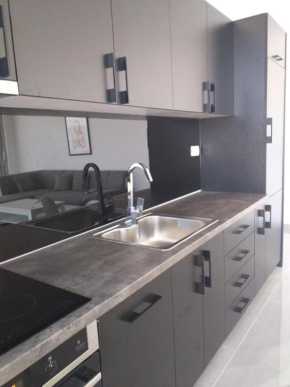 Kuchyň nebo kuchyňský kout v ubytování Lunde Sea View Apartment