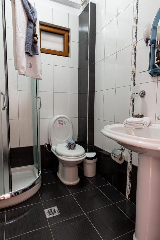 Koupelna v ubytování Great Alexander Suites