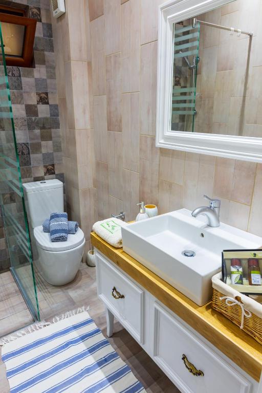 Koupelna v ubytování Great Alexander Suites