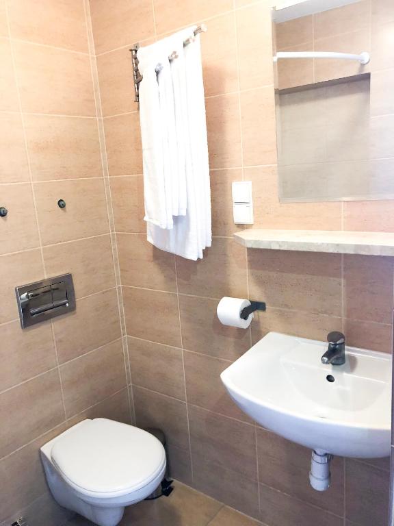Kúpeľňa v ubytovaní Pokoje Gościnne Przy Molo