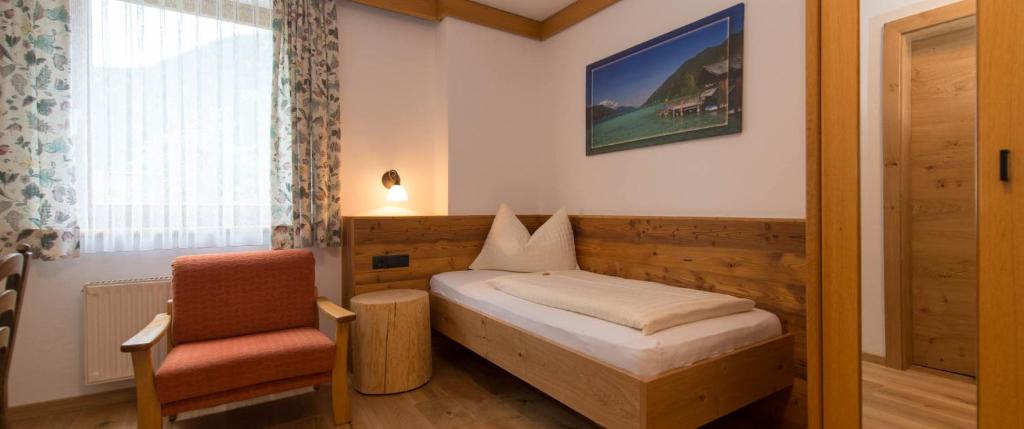 Postel nebo postele na pokoji v ubytování Hotel Brunnwirt