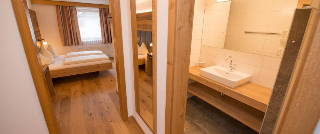 Postel nebo postele na pokoji v ubytování Hotel Brunnwirt