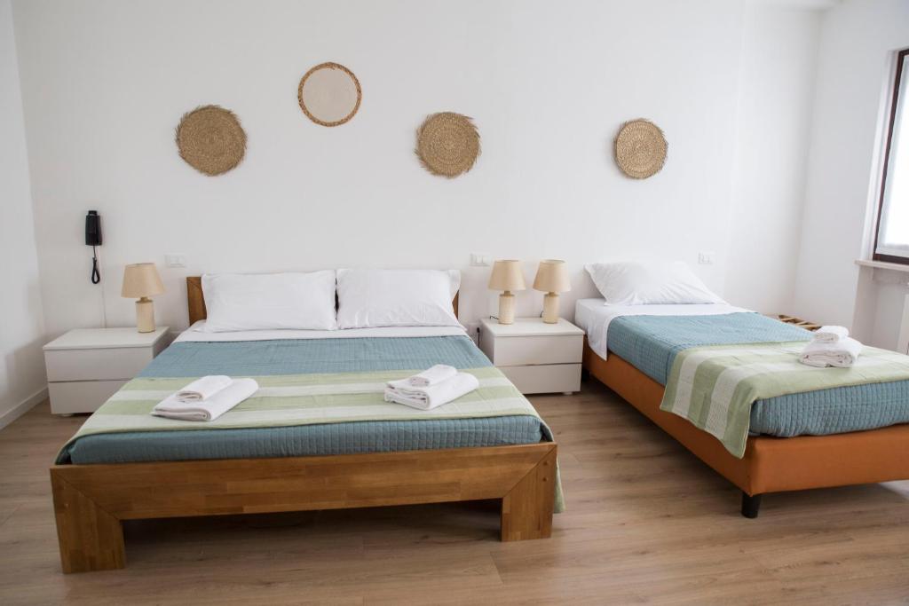 Postel nebo postele na pokoji v ubytování Albergo Mio Boutique Hotel - Adults Only
