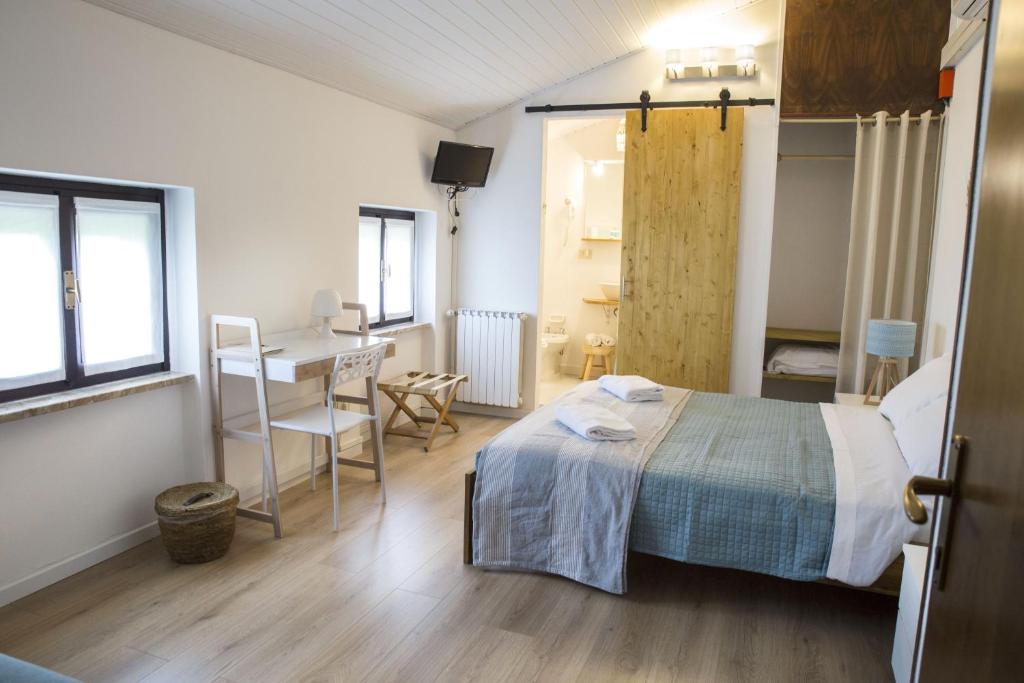 Postel nebo postele na pokoji v ubytování Albergo Mio Boutique Hotel - Adults Only