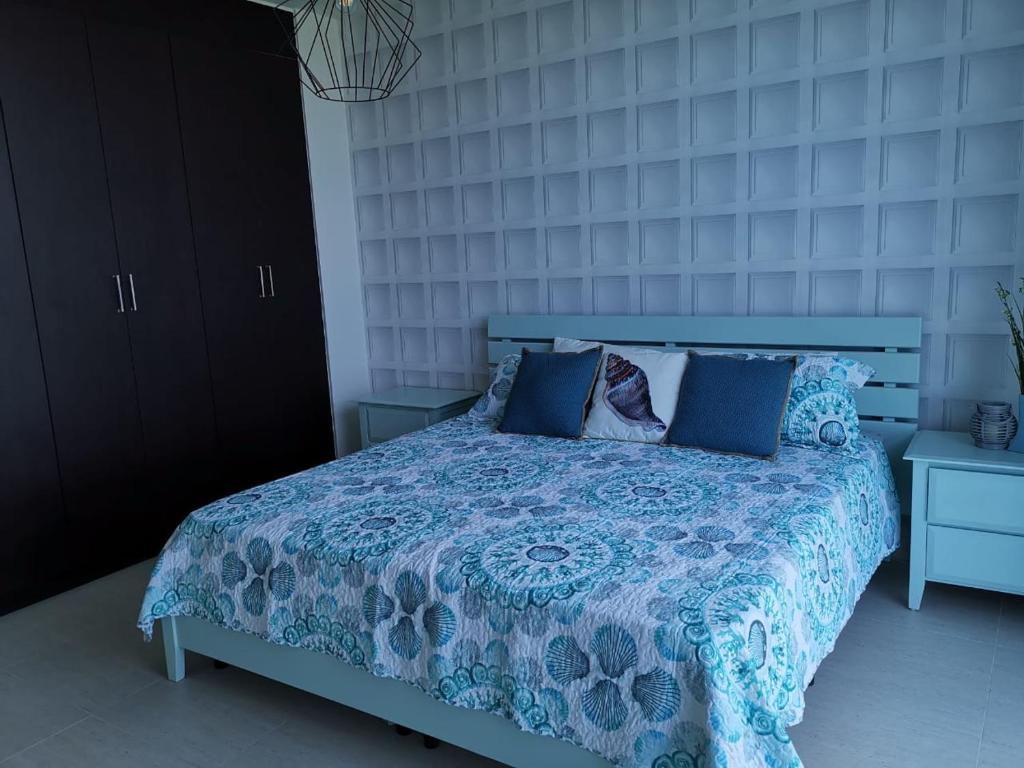 A bed or beds in a room at Ocean 3, Playa Blanca