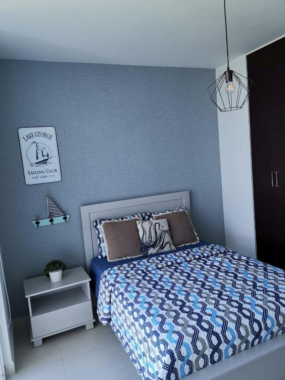 A bed or beds in a room at Ocean 3, Playa Blanca