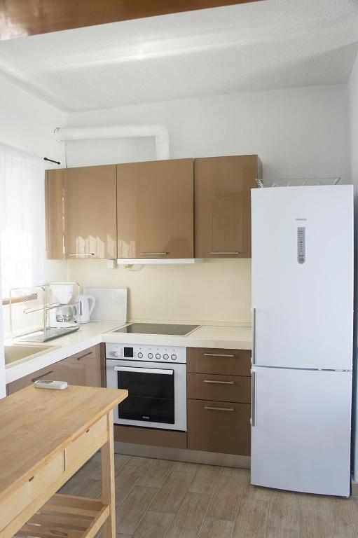 Kuchyň nebo kuchyňský kout v ubytování Possidi Aigaiopelagitika 2-floor beach house