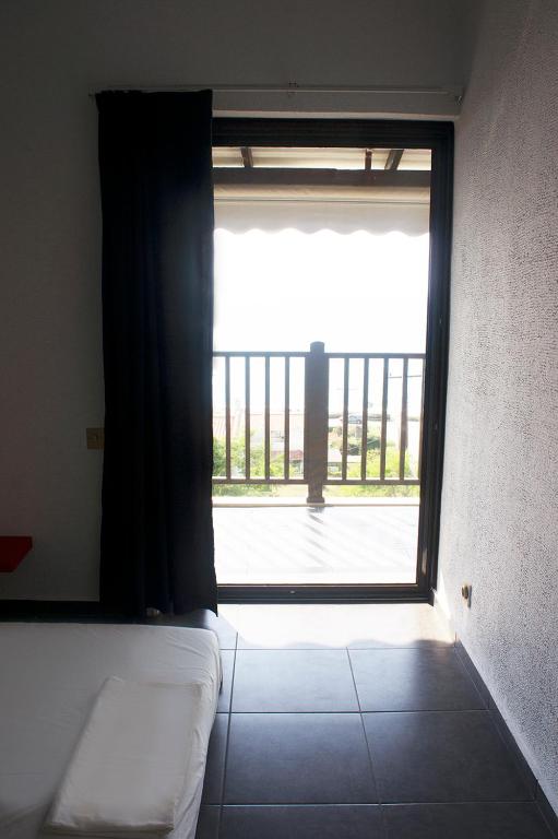 Postel nebo postele na pokoji v ubytování Possidi Aigaiopelagitika 2-floor beach house