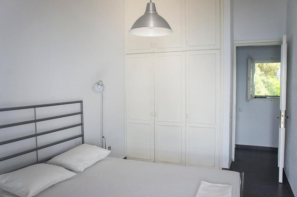 Postel nebo postele na pokoji v ubytování Possidi Aigaiopelagitika 2-floor beach house