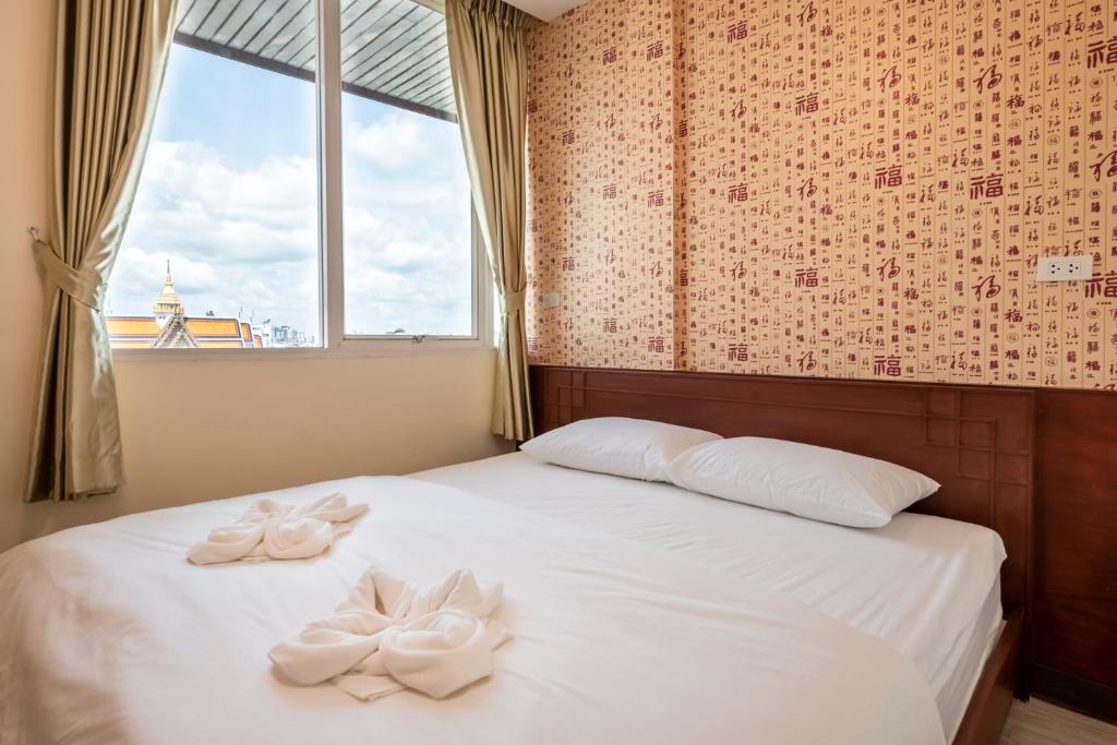 Postel nebo postele na pokoji v ubytování Scala Hostel