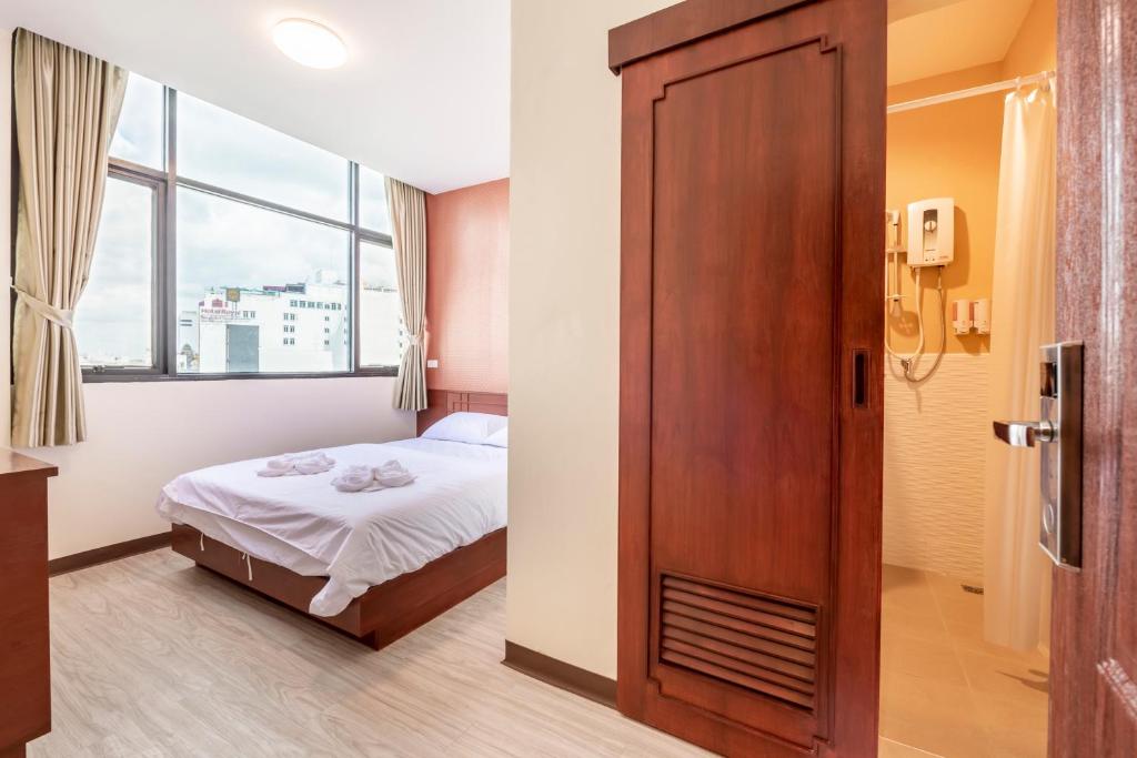 Postel nebo postele na pokoji v ubytování Scala Hostel