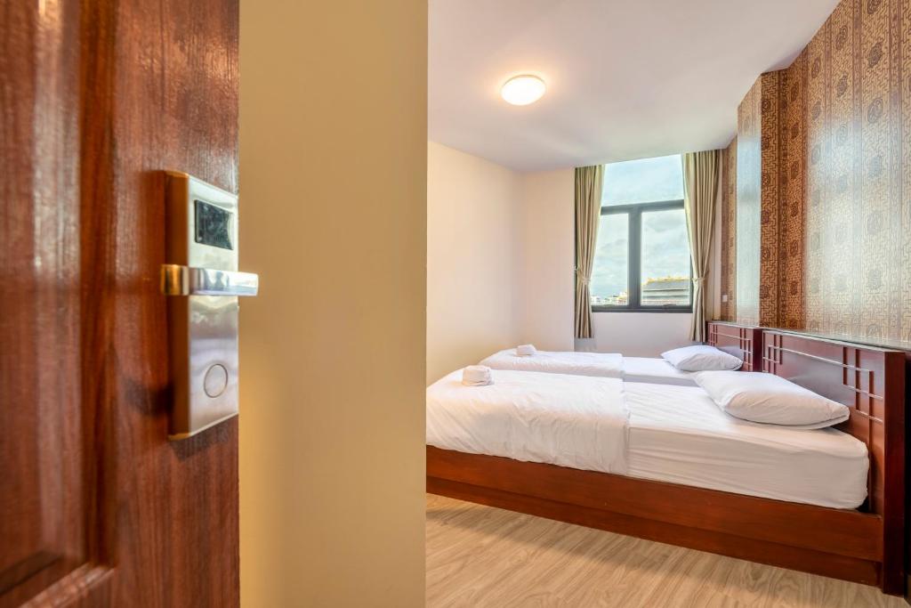 Postel nebo postele na pokoji v ubytování Scala Hostel