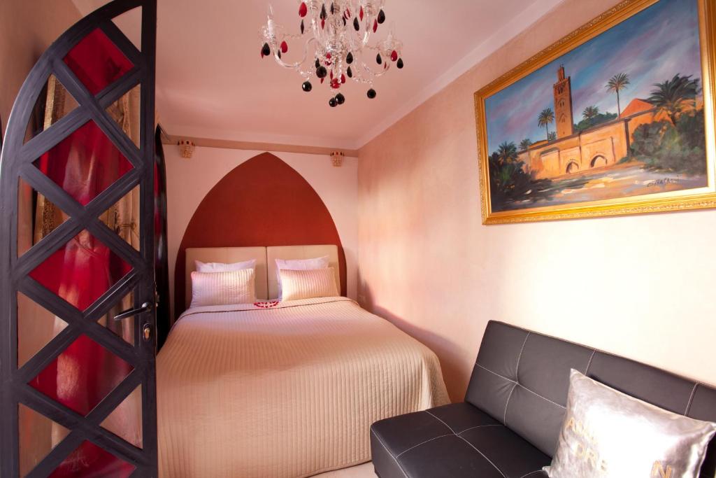 Postel nebo postele na pokoji v ubytování Riad Le Rubis