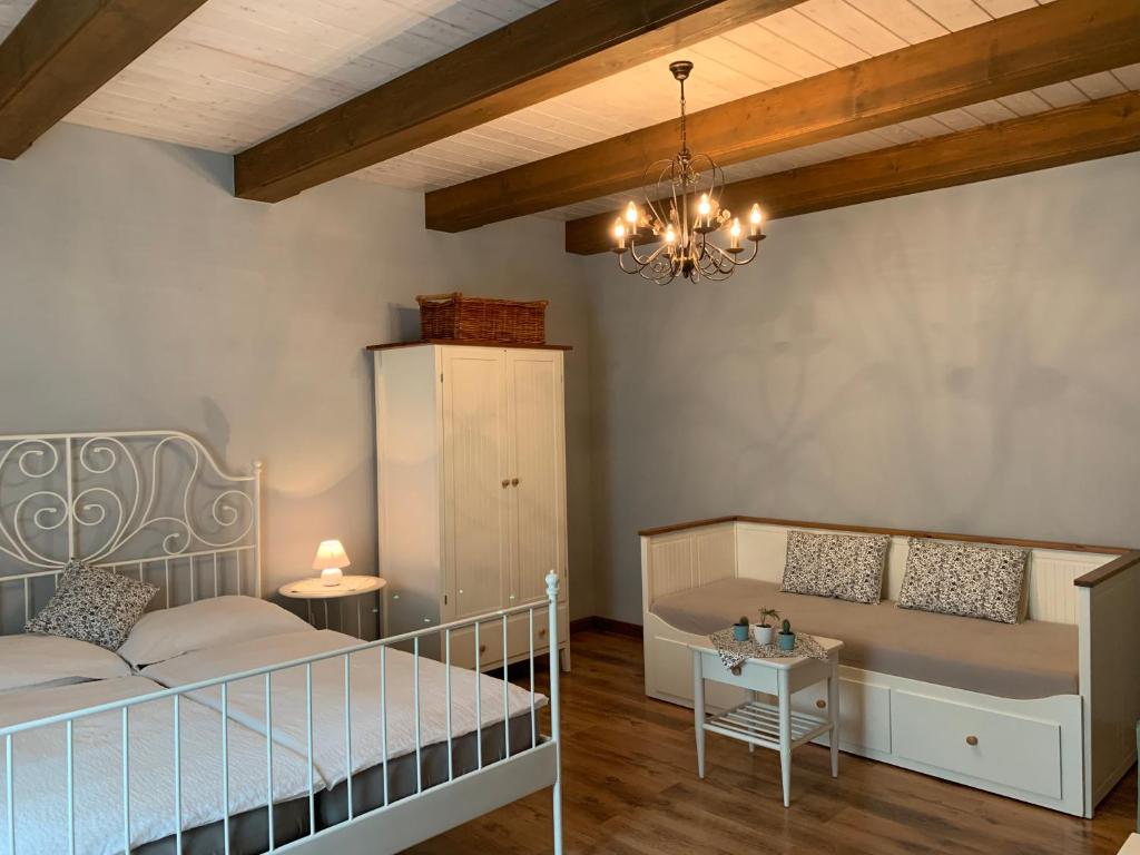 Postel nebo postele na pokoji v ubytování Pension Amadeus & Apartments