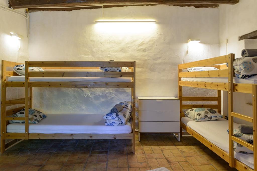 Postel nebo postele na pokoji v ubytování Mas Nofre