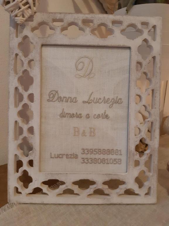 Certifikát, hodnocení, plakát nebo jiný dokument vystavený v ubytování Donna Lucrezia dimora a corte B&B