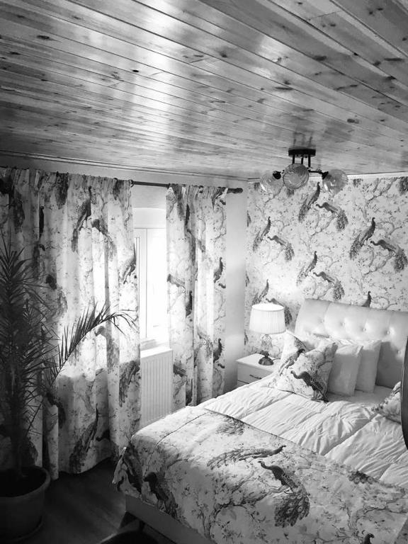 Postel nebo postele na pokoji v ubytování Guest House Stena