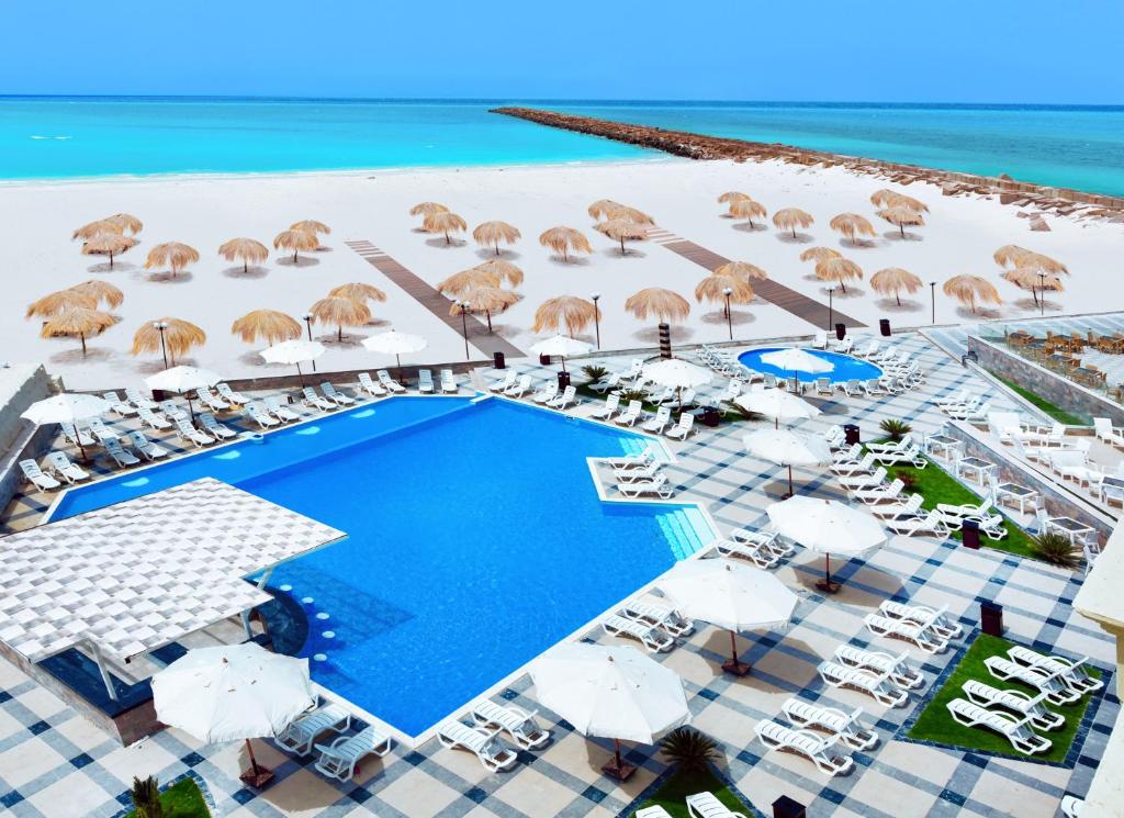 Výhled na bazén z ubytování Hotelux La Playa Alamein nebo okolí