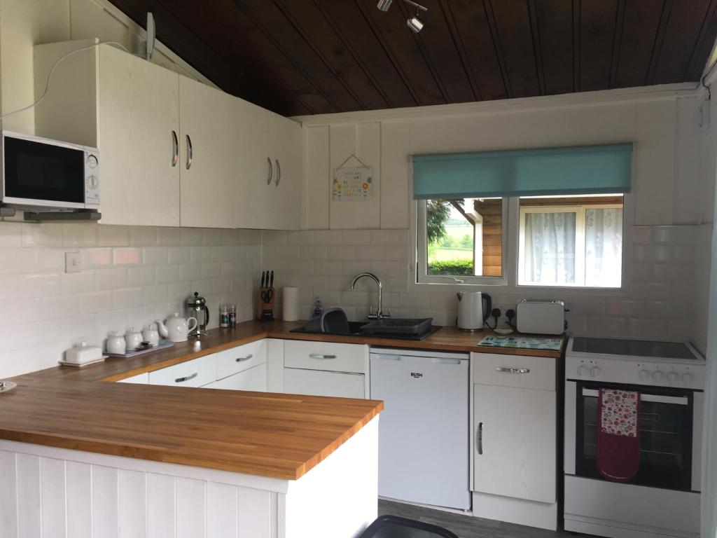 Kuchyň nebo kuchyňský kout v ubytování Chalet 26