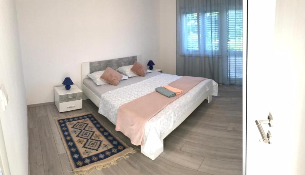 Posteľ alebo postele v izbe v ubytovaní Kambi