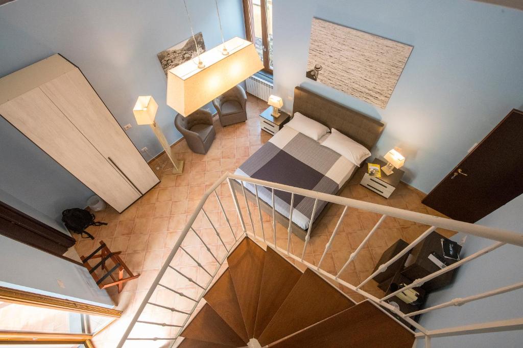 Łóżko lub łóżka w pokoju w obiekcie Casa d'amare
