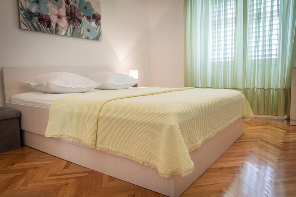 Posteľ alebo postele v izbe v ubytovaní Apartments Fanito