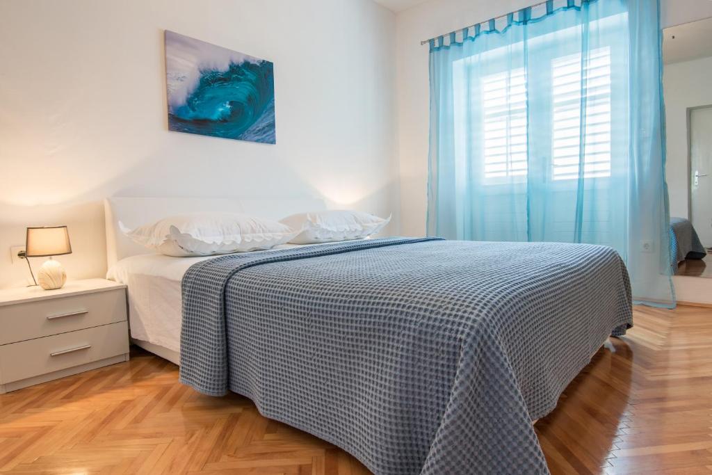 Posteľ alebo postele v izbe v ubytovaní Apartments Fanito