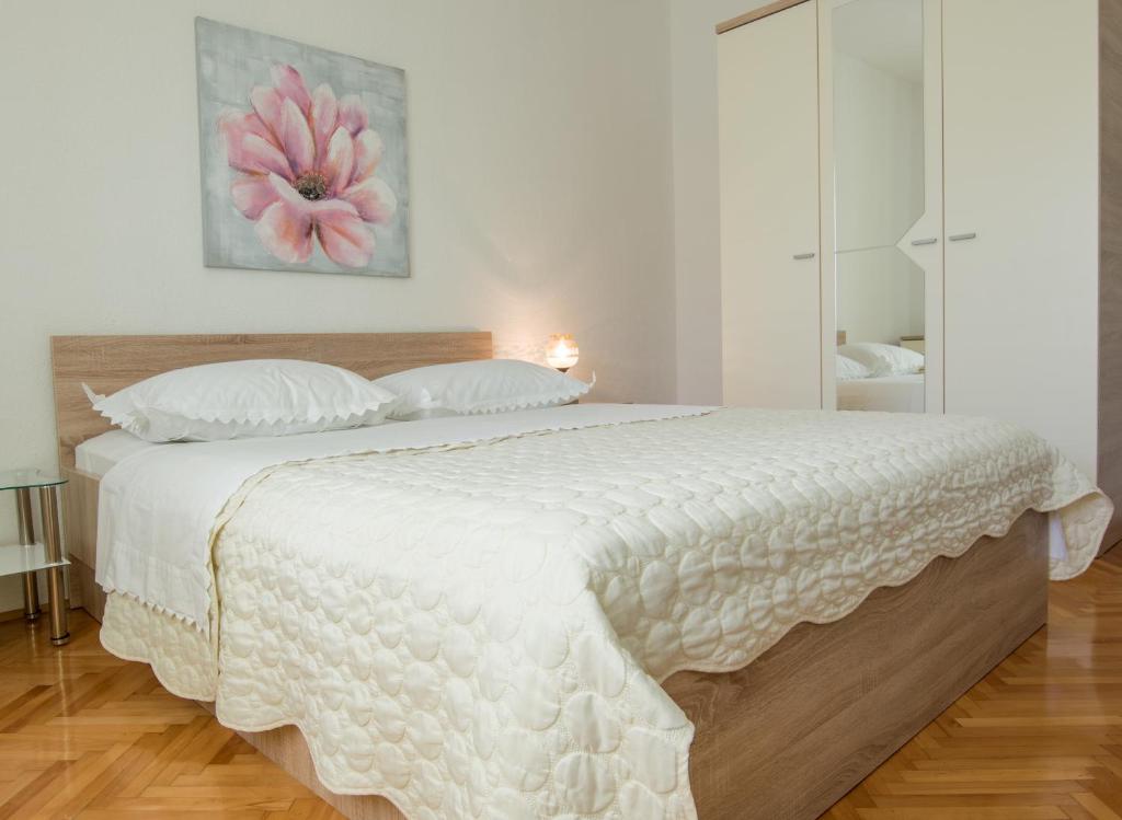 Posteľ alebo postele v izbe v ubytovaní Apartments Fanito