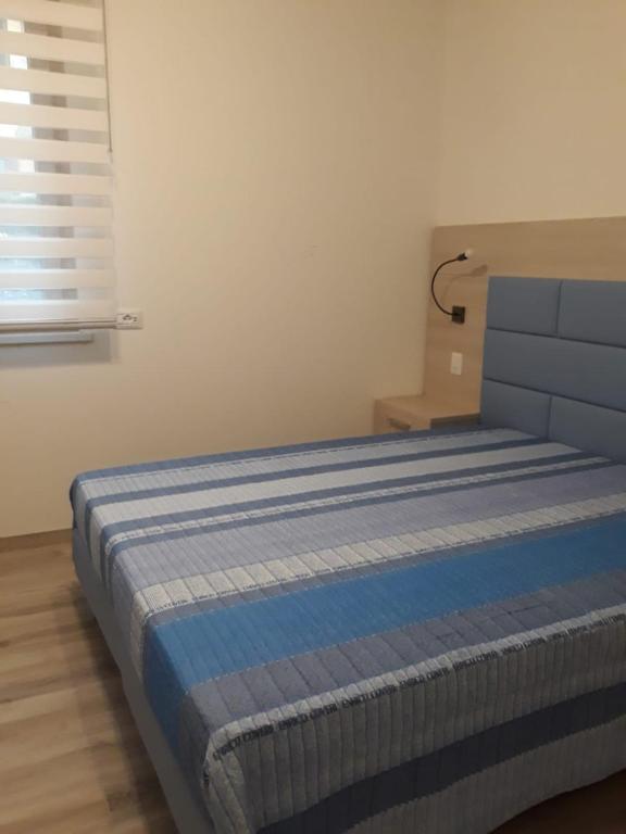 Postel nebo postele na pokoji v ubytování Il Sole e la Luna B&B in Garda
