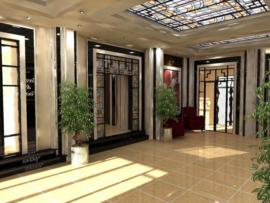 un vestíbulo con plantas y un tragaluz en un edificio en Park Hotel Bogorodsk, en Bogorodsk