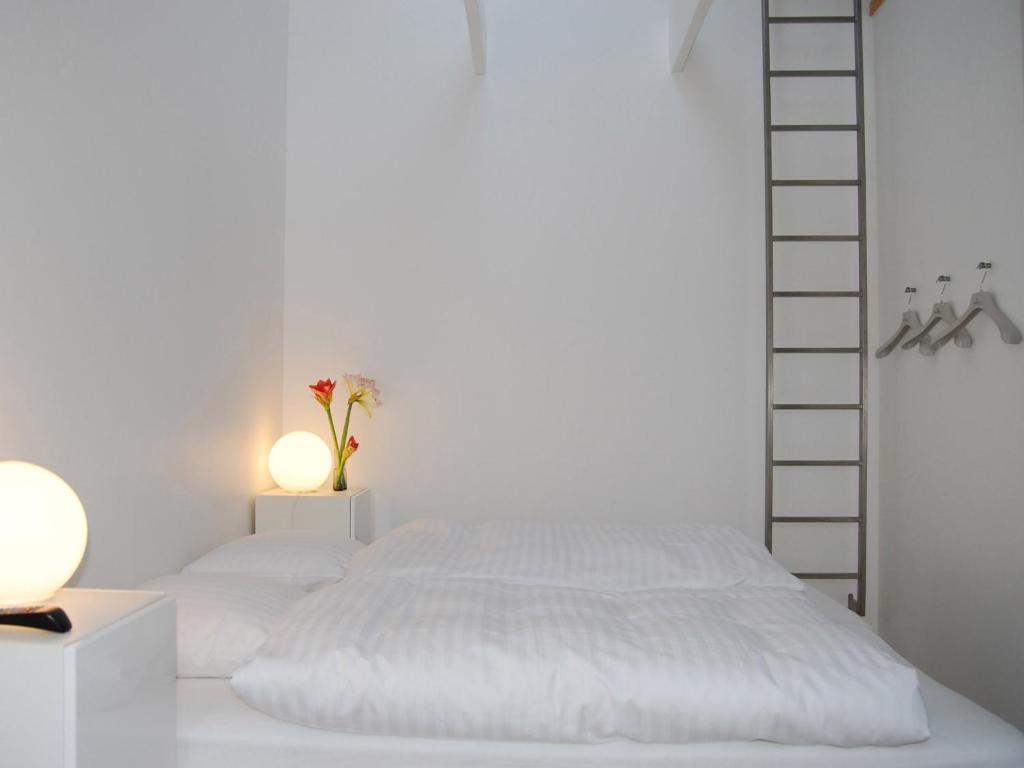 Voodi või voodid majutusasutuse Rum og rooms toas