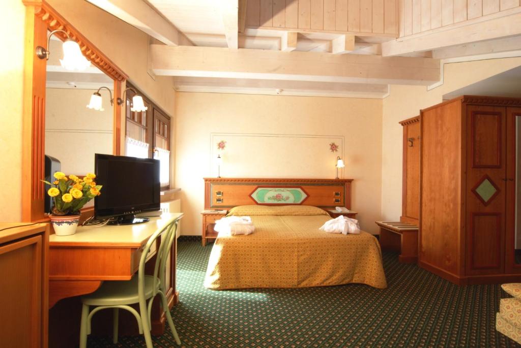 Postel nebo postele na pokoji v ubytování Hotel Ideal