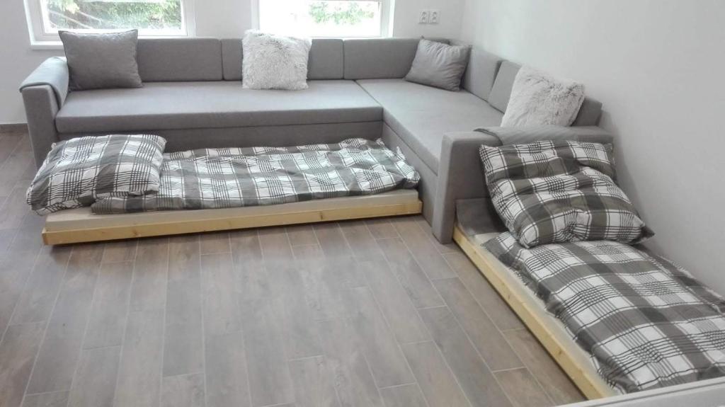 Postel nebo postele na pokoji v ubytování Apartmán Horní Mísečky J4