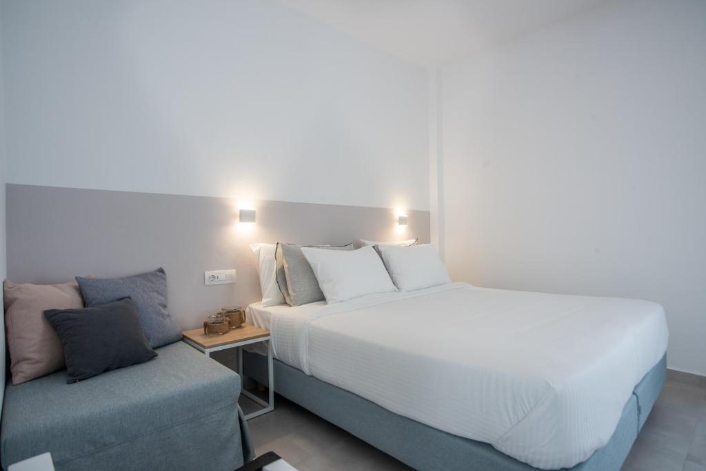 Postel nebo postele na pokoji v ubytování Nautilus Apartments-Suites