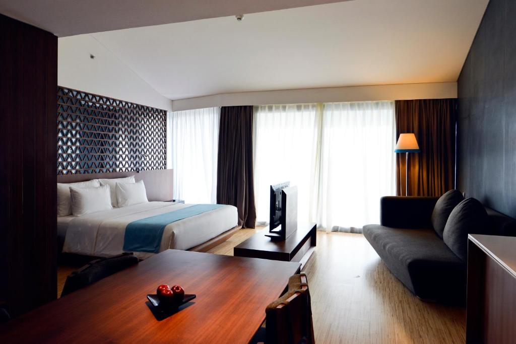 Postel nebo postele na pokoji v ubytování IZE Seminyak by LifestyleRetreats