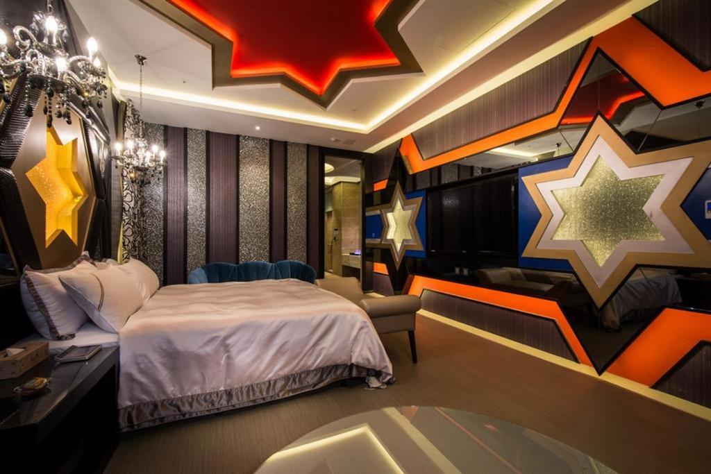 Katil atau katil-katil dalam bilik di U-Her Hotel