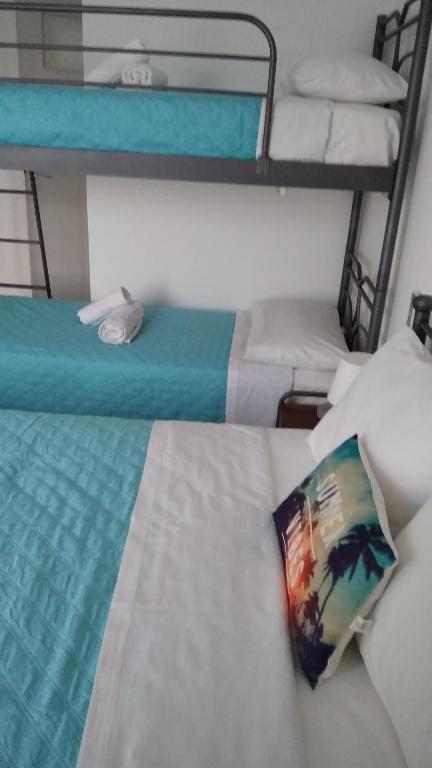 Llit o llits en una habitació de Psathi Beach