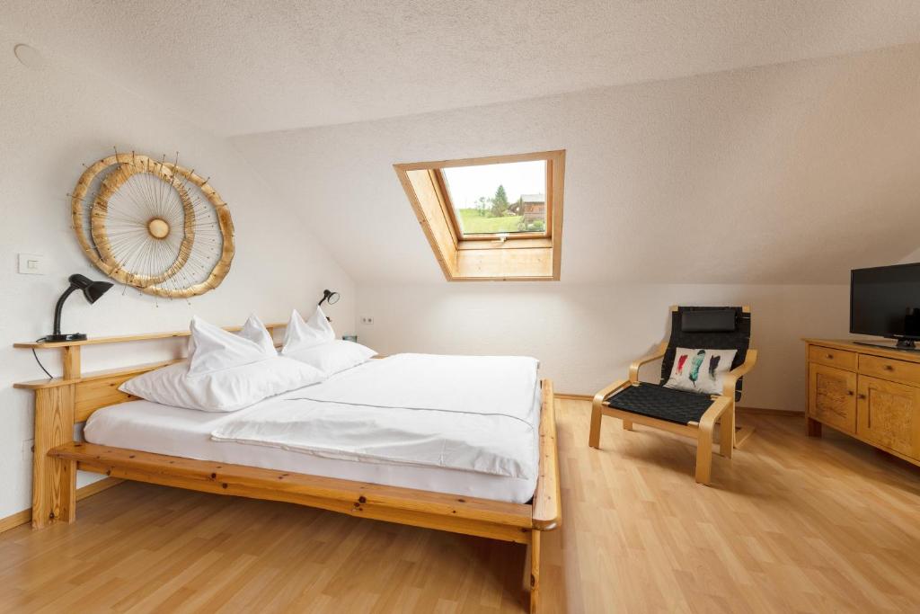 Postel nebo postele na pokoji v ubytování WÄLDERHAUS Apartments