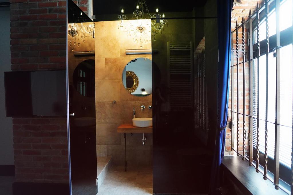 Kúpeľňa v ubytovaní Apartamenty Centrum RS SUITES Kowalska 12