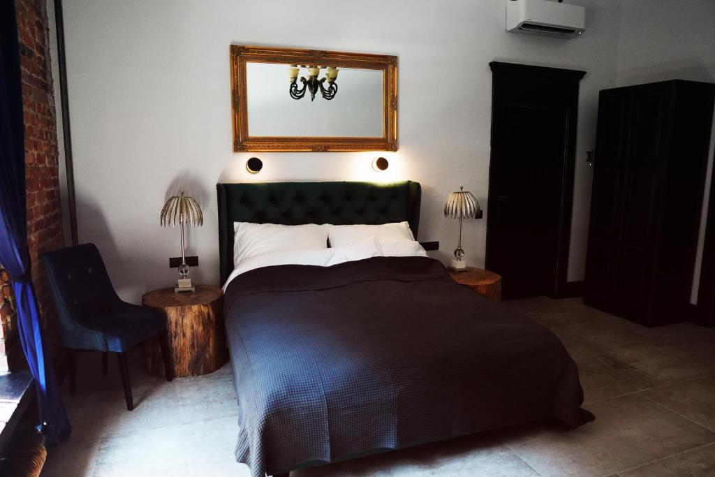 Posteľ alebo postele v izbe v ubytovaní Apartamenty Centrum RS SUITES Kowalska 12