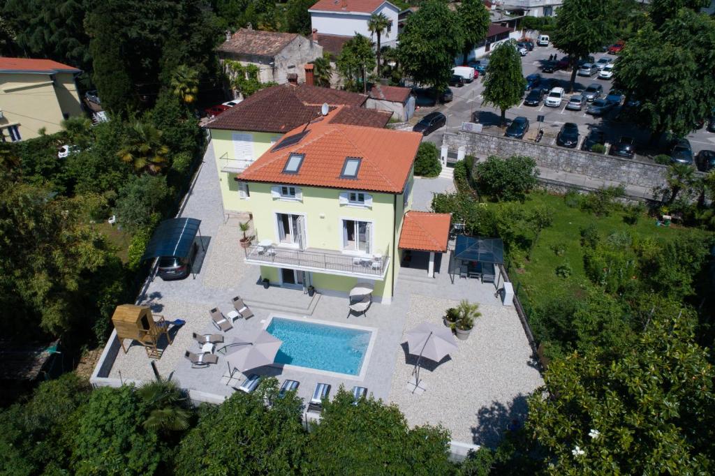 an aerial view of a house with a swimming pool at Villa Lorenzo in Lovran
