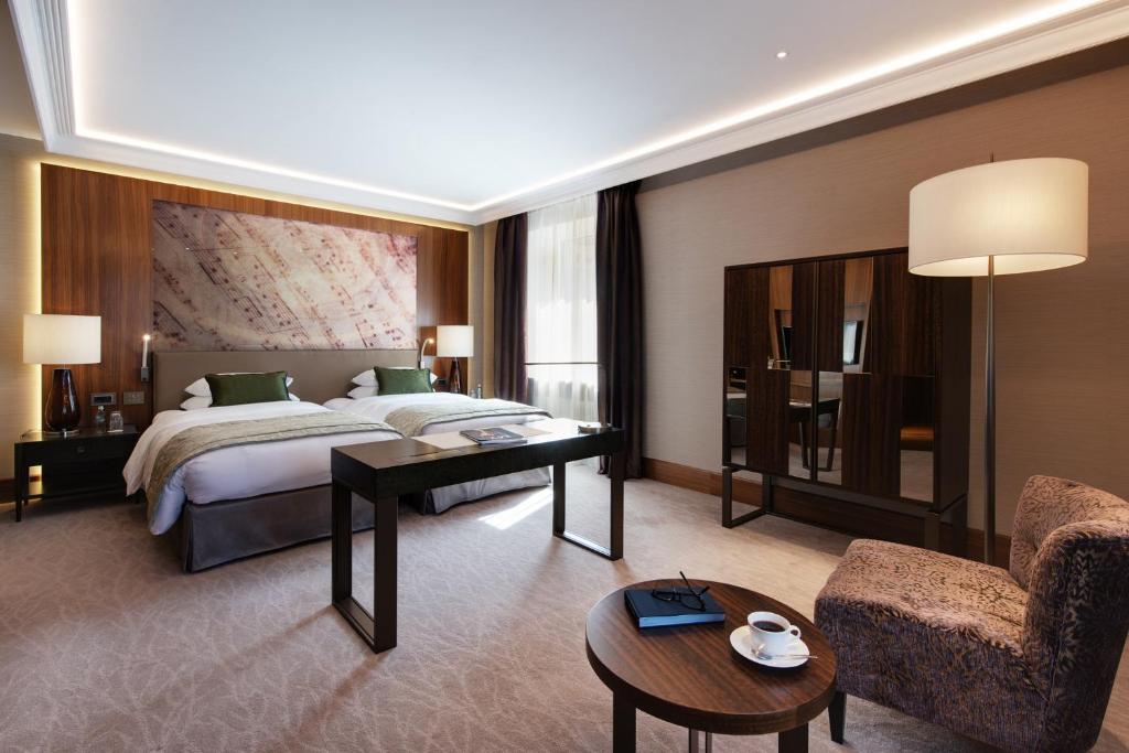 Postel nebo postele na pokoji v ubytování Grand Hotel Kempinski Riga