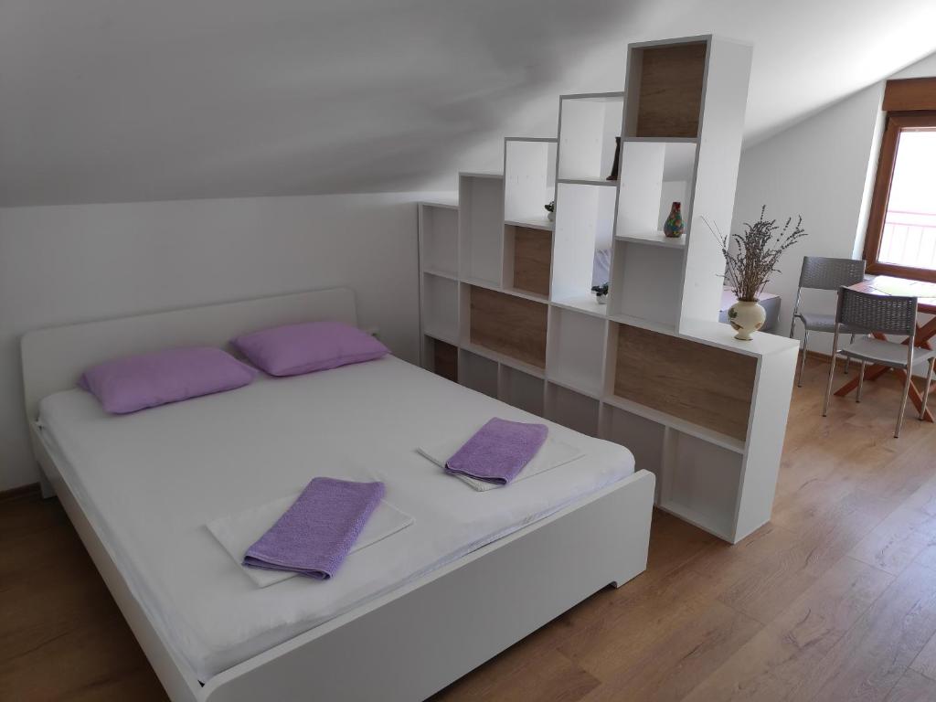 Posteľ alebo postele v izbe v ubytovaní Apartman Anicic
