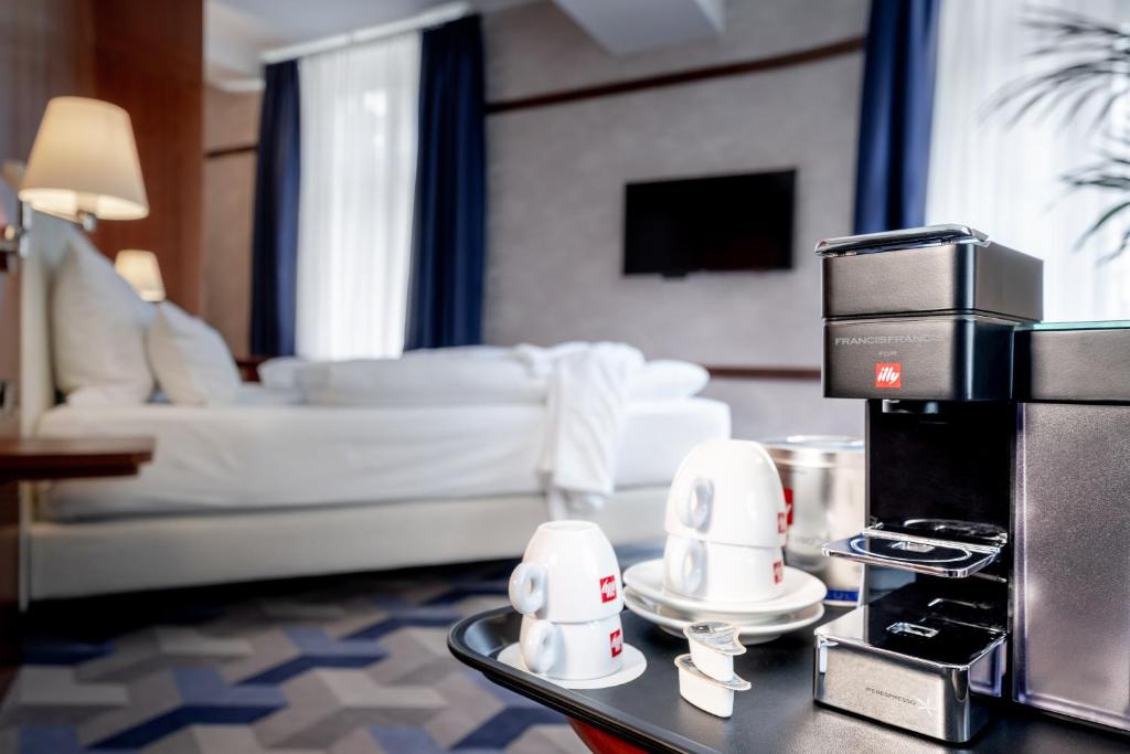 TV a/nebo společenská místnost v ubytování Seaside Park Hotel Leipzig