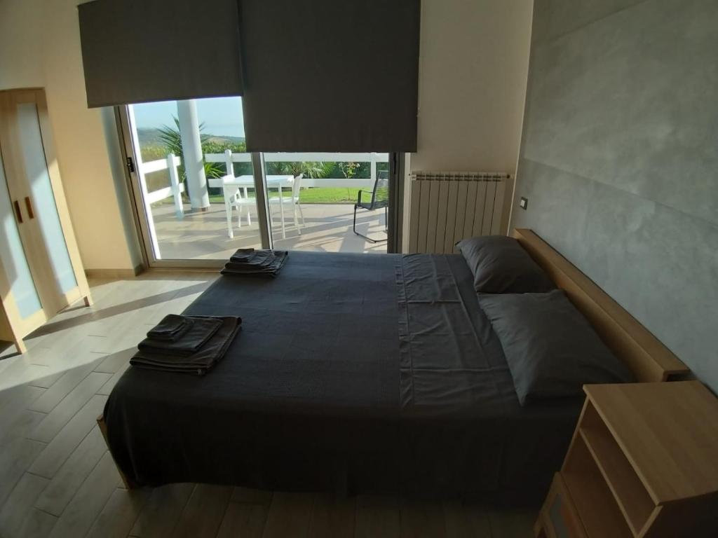 Postel nebo postele na pokoji v ubytování Colle Selvotta