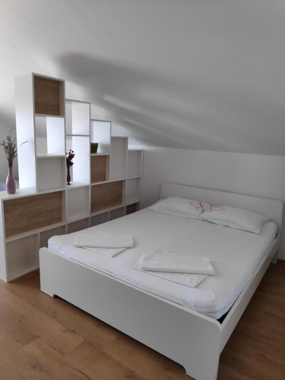 Posteľ alebo postele v izbe v ubytovaní Apartman Anicic