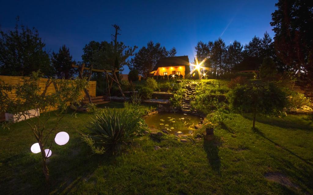 Vonkajšia záhrada v ubytovaní Domek drewniany Wiakówka