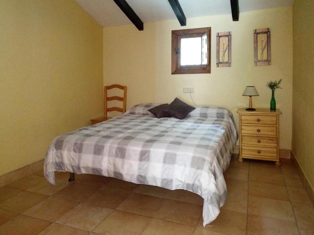 Postel nebo postele na pokoji v ubytování Finca El Carrascal