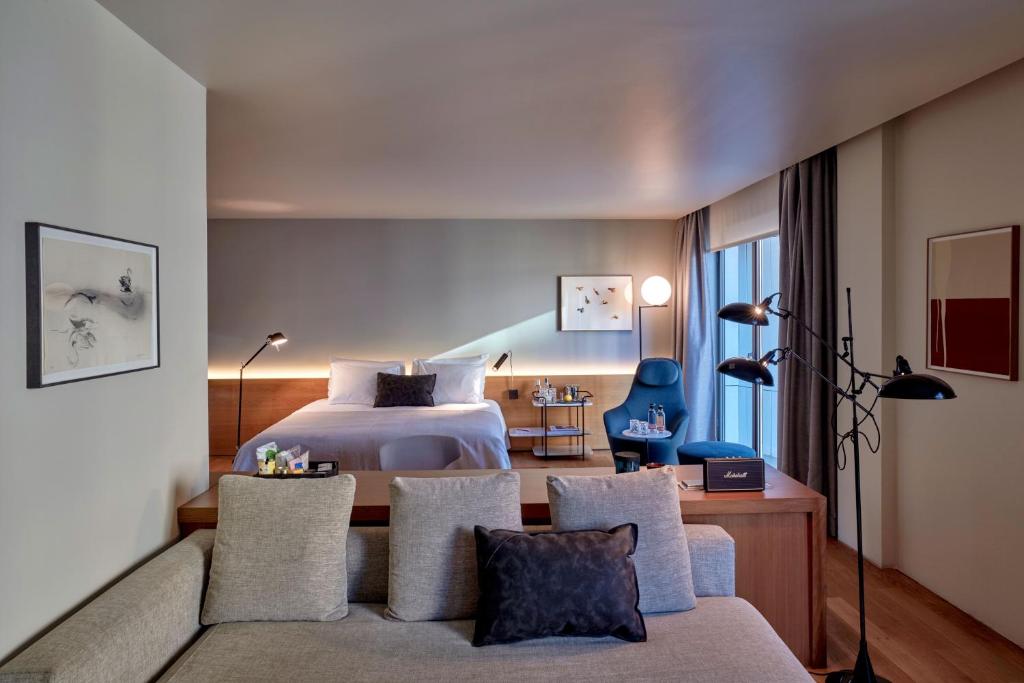 A bed or beds in a room at Sir Victor Hotel, part of Sircle Collection