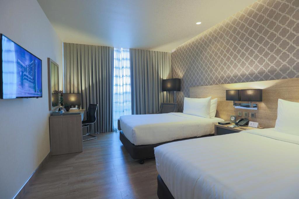 bai Hotel Cebuにあるベッド